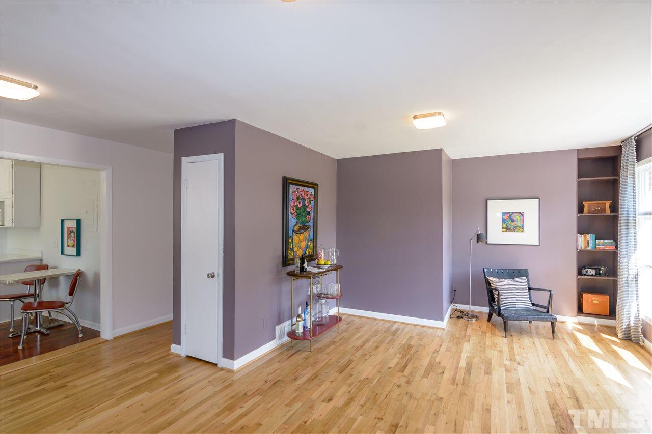 1800 Charles Raleigh, NC 27610 - Photo 6 of 28 a workspace with furniture and wooden floor