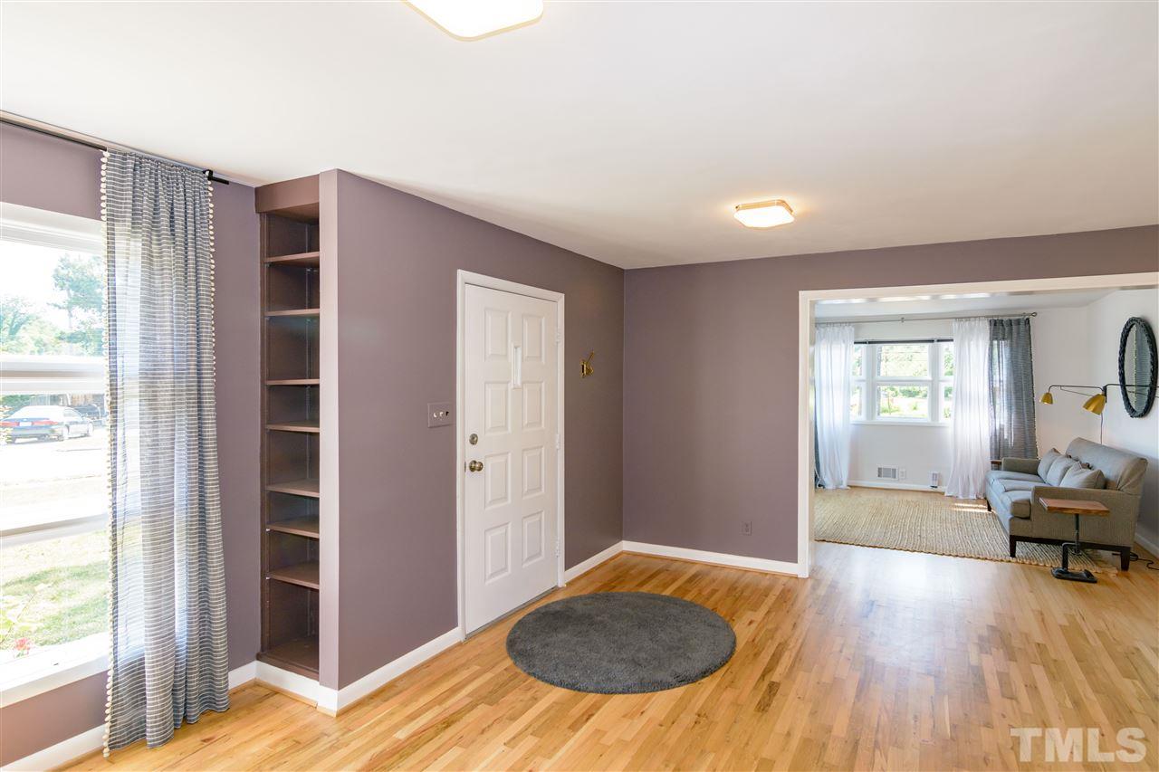 1800 Charles Raleigh, NC 27610 - Photo 8 of 28 a view of a livingroom with furniture and an empty room