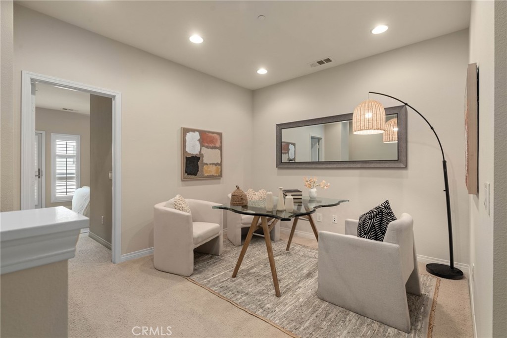 12913 Mission Hawthorne Ca, Unit 108 Hawthorne, CA 90250 - Photo 13 of 31 a living room with furniture and a potted plant