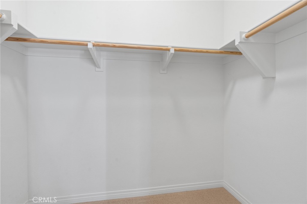 12913 Mission Hawthorne Ca, Unit 108 Hawthorne, CA 90250 - Photo 18 of 31 a view of a rack on the wall