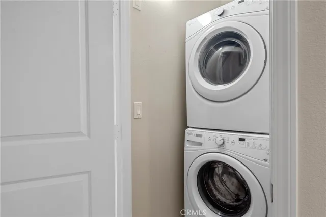 a close up view of a washer and dryer in a utility room