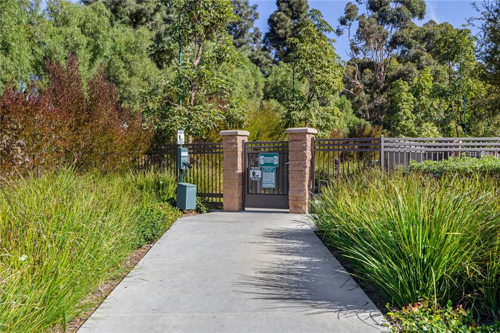 12913 Mission Hawthorne Ca, Unit 108 Hawthorne, CA 90250 - Photo 30 of 31 a view of a pathway of a garden