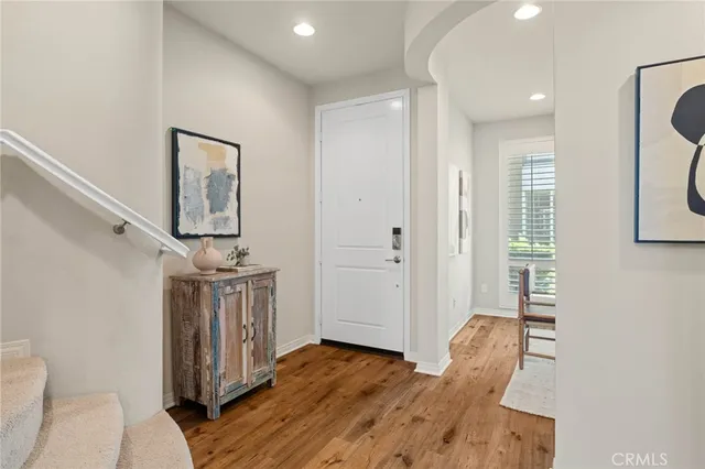a view of entryway with wooden floor
