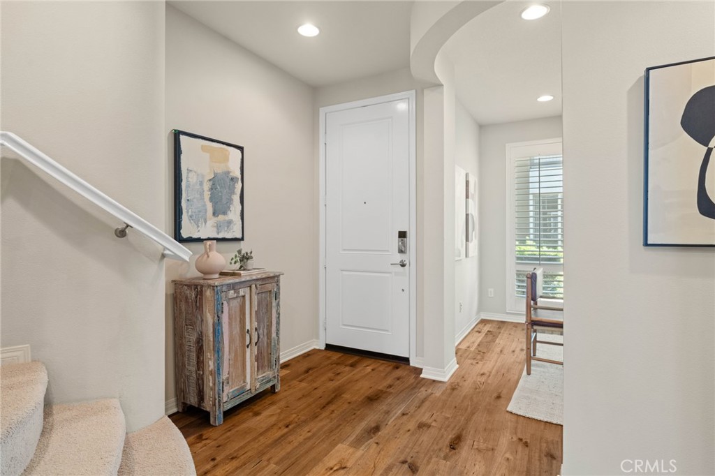 12913 Mission Hawthorne Ca, Unit 108 Hawthorne, CA 90250 - Photo 4 of 31 a view of entryway with wooden floor