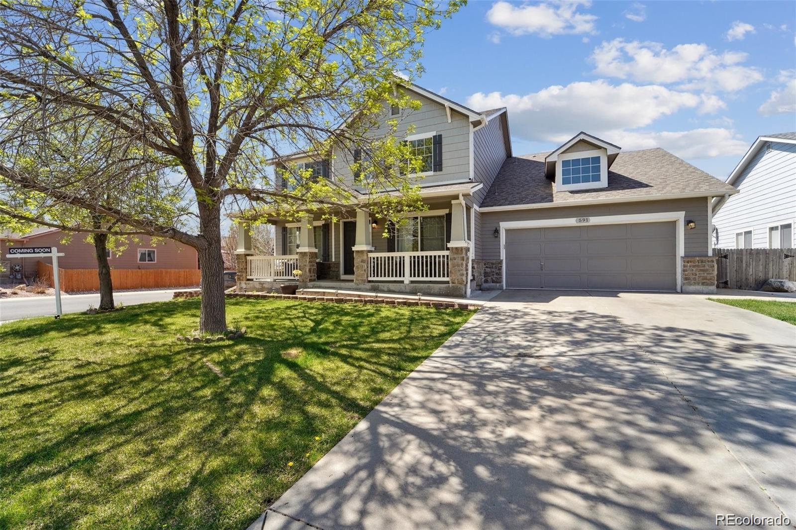 591 Rio Rancho Way Brighton, CO 80601 - Photo 1 of 47 a front view of a house with a yard