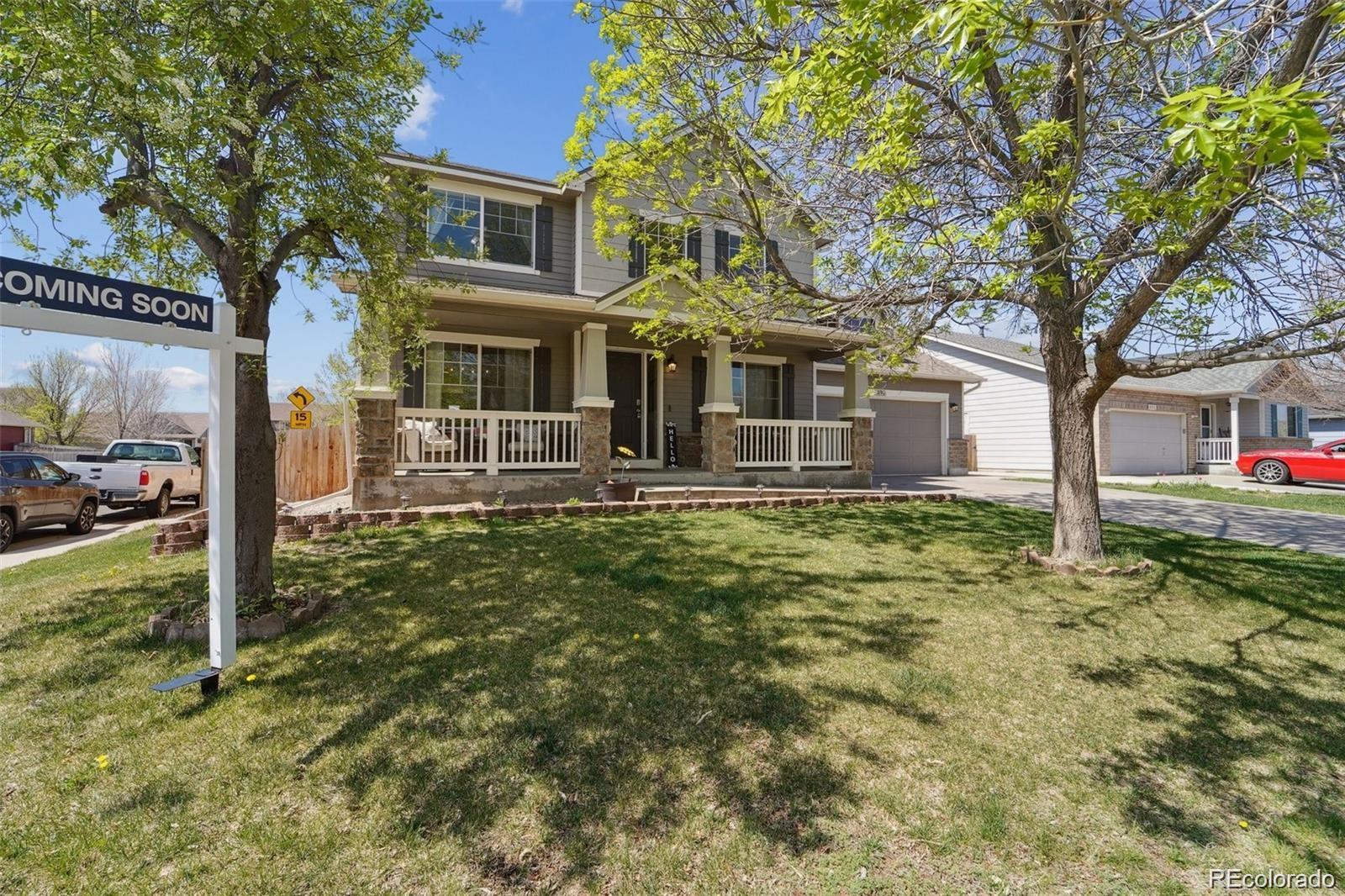 591 Rio Rancho Way Brighton, CO 80601 - Photo 2 of 47 a front view of a house with a yard