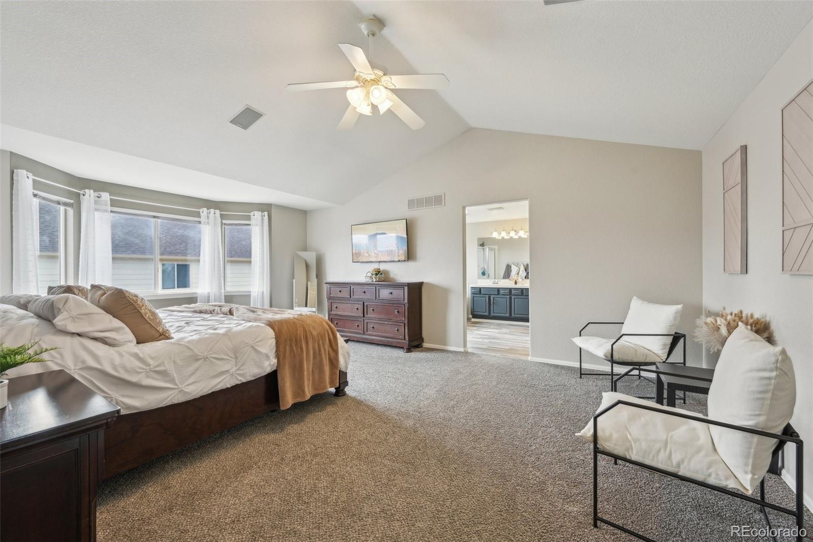 591 Rio Rancho Way Brighton, CO 80601 - Photo 24 of 47 a living room with furniture and a large window
