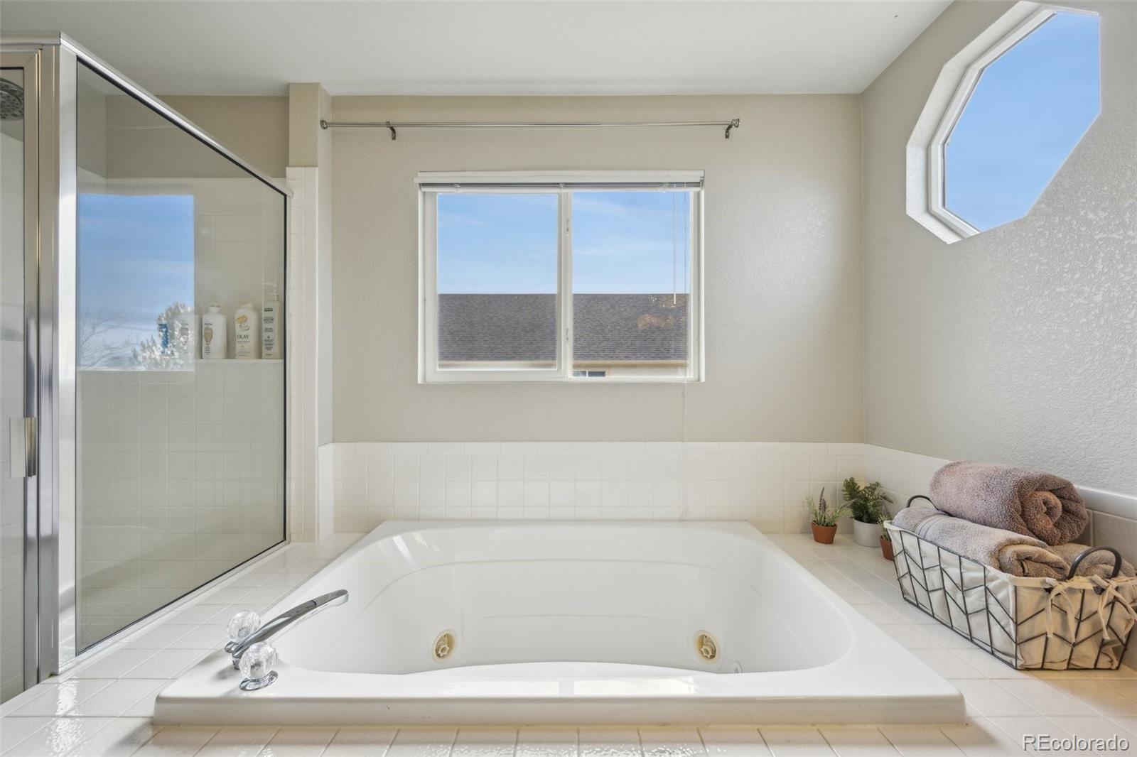 591 Rio Rancho Way Brighton, CO 80601 - Photo 26 of 47 a bathroom with a bathtub