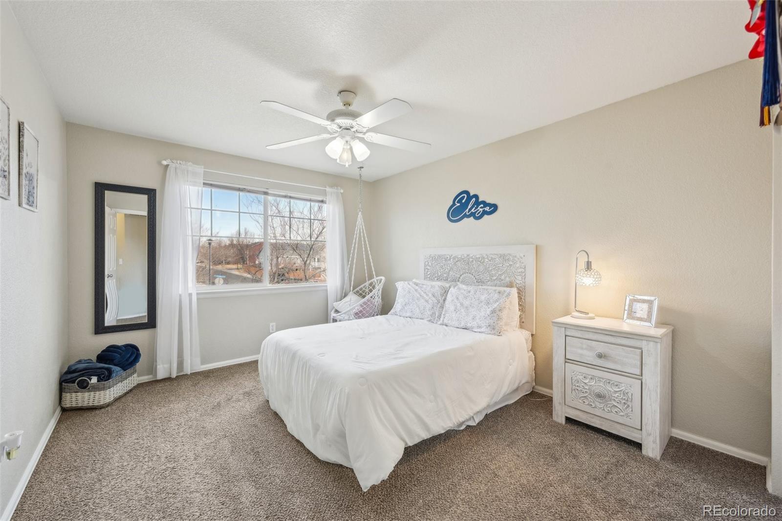 591 Rio Rancho Way Brighton, CO 80601 - Photo 29 of 47 a bedroom with a bed and a window