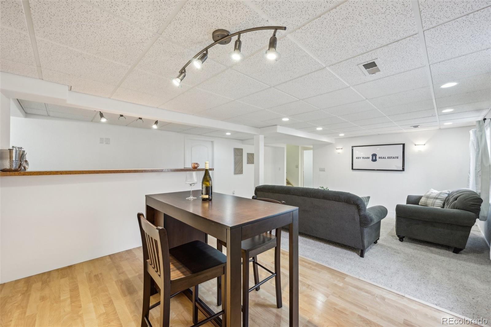591 Rio Rancho Way Brighton, CO 80601 - Photo 37 of 47 a view of a dining room with furniture