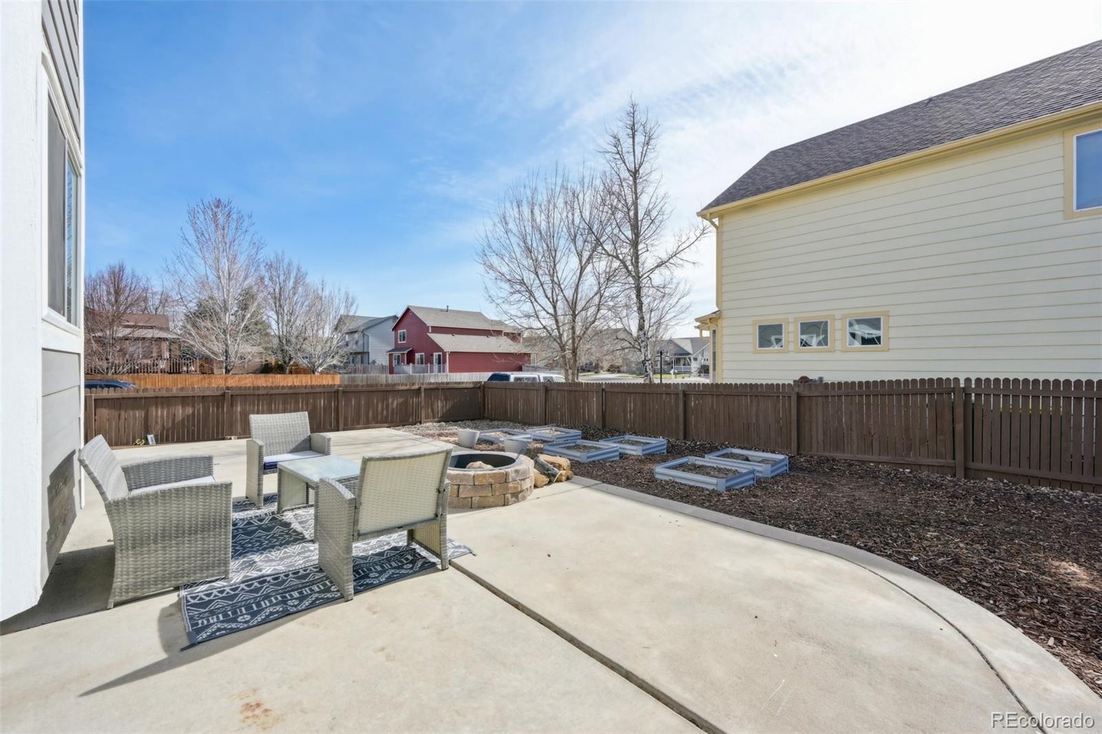 591 Rio Rancho Way Brighton, CO 80601 - Photo 46 of 47 a view of a patio with couches and chairs