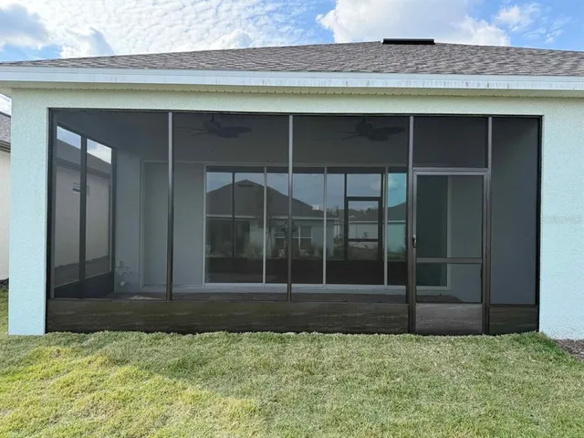 a view of a house with swimming pool