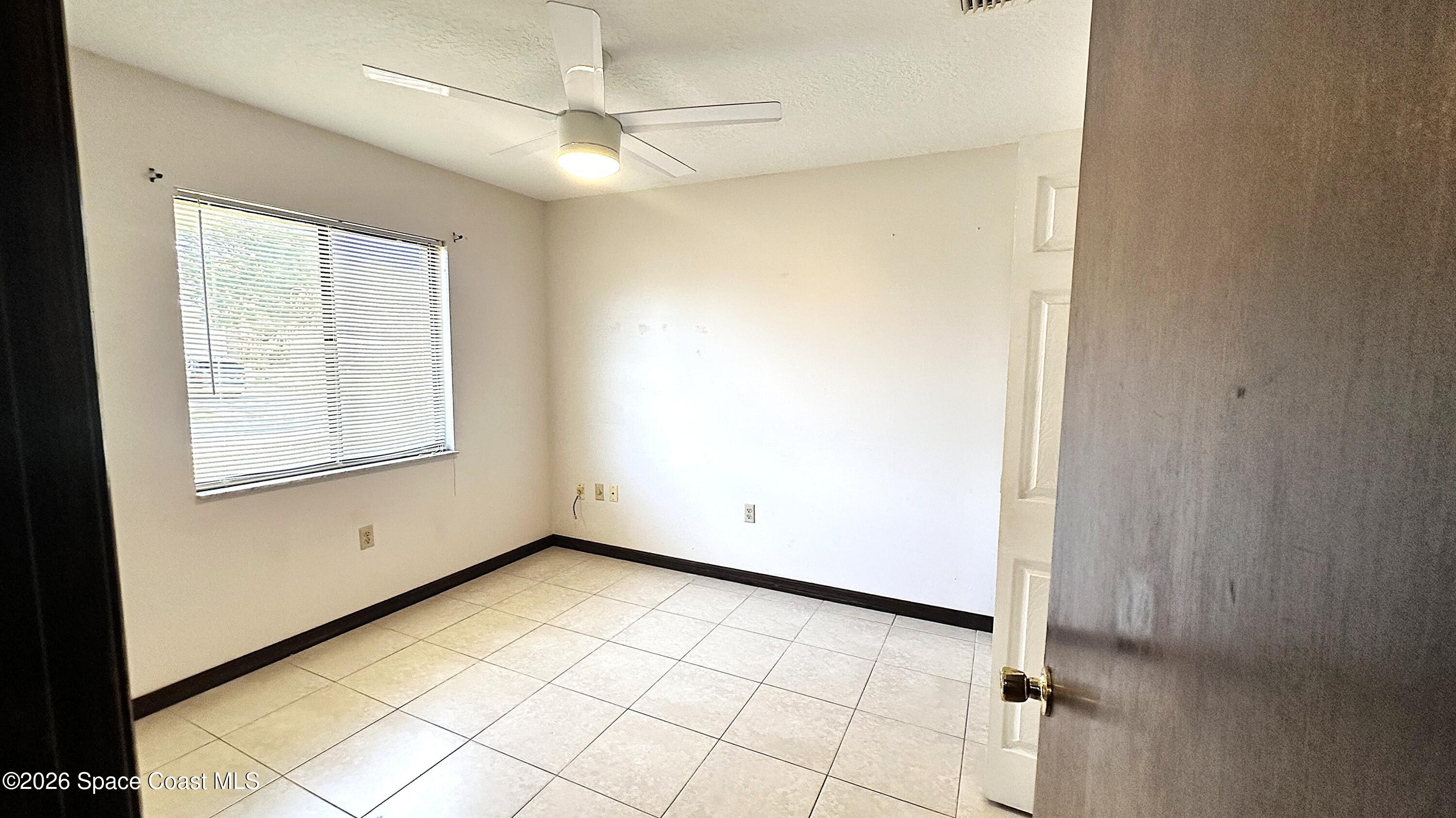 931 Commerce Road Southeast Palm Bay, FL 32909 - Photo 14 of 19 Bedroom 3