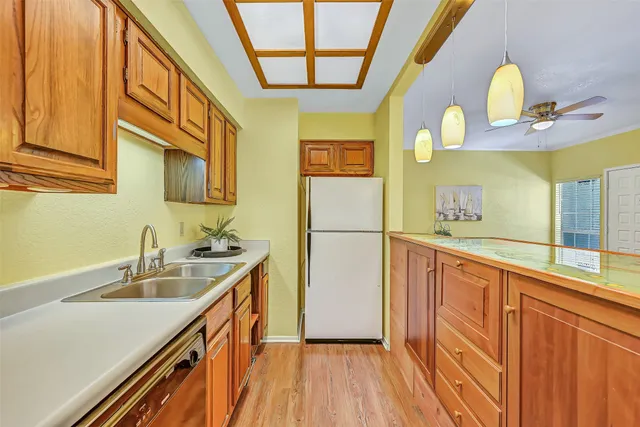 a bathroom with a sink a mirror and a shower