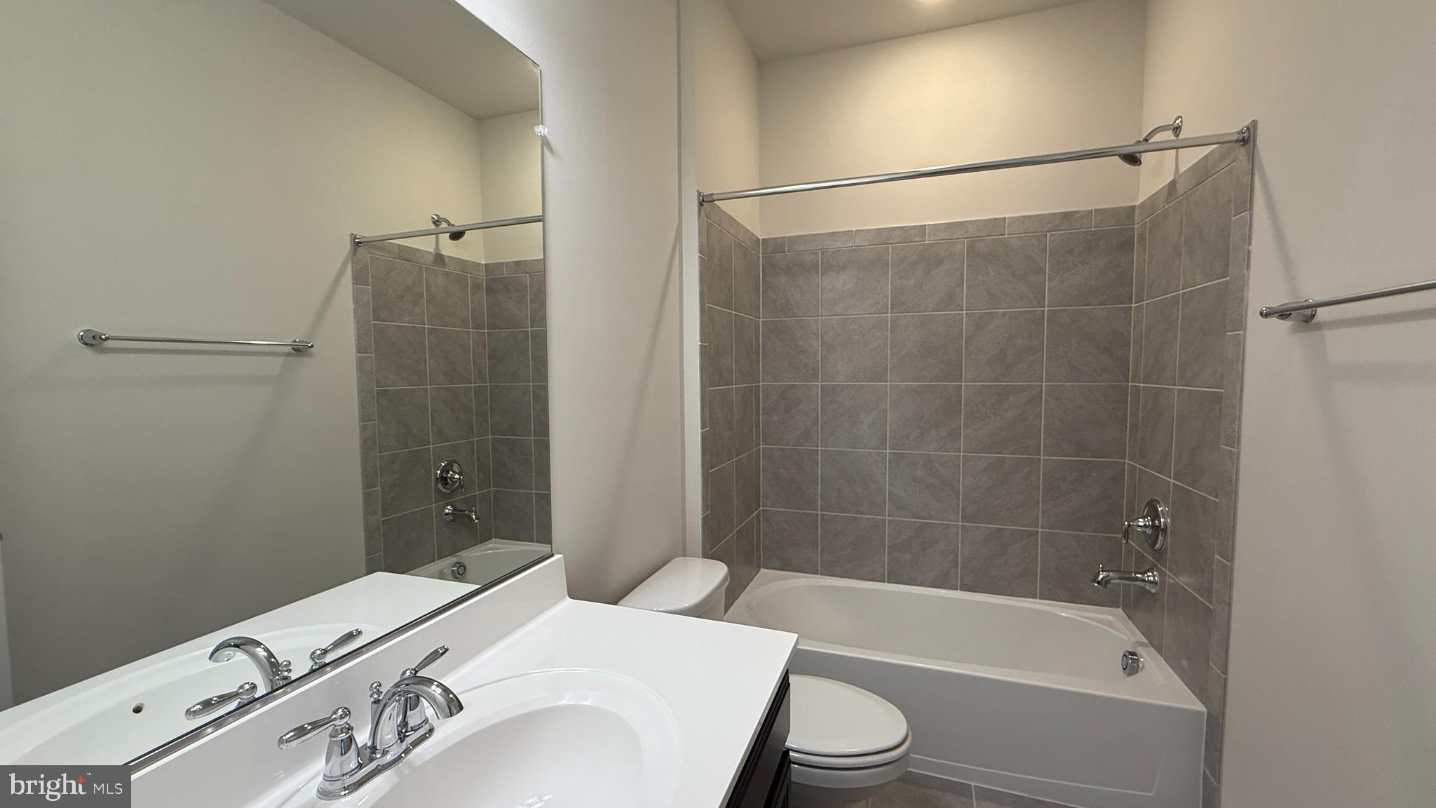 1949 Greenbriar Hall Road Dumfries, VA 22026 - Photo 18 of 26 a bathroom with a sink and a bathtub