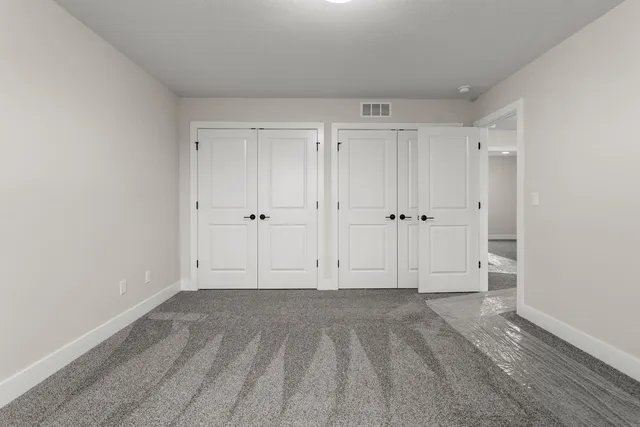 a view of room with hardwood floor