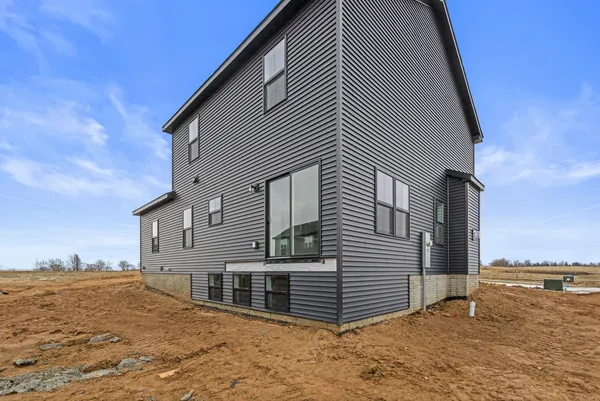 a view of a house with a ocean view