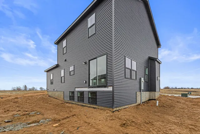 a view of a house with a ocean view