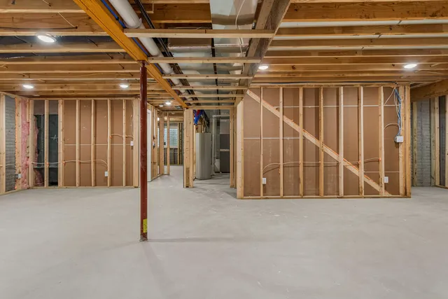 a picture of a wall with a white building and a white wall