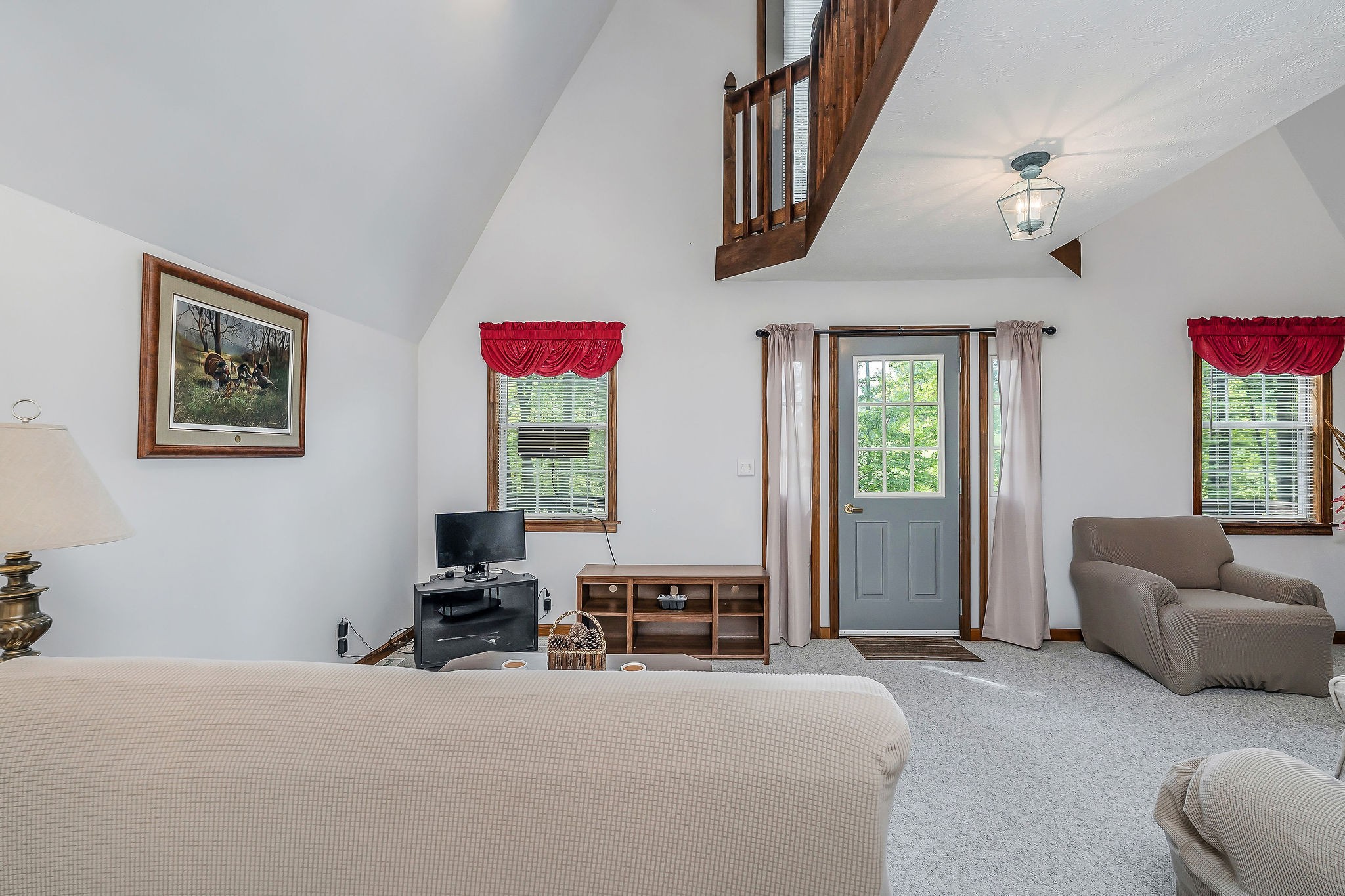 308 Cosby Parris Road Byrdstown, TN 38549 - Photo 12 of 32 a living room with furniture and a large window