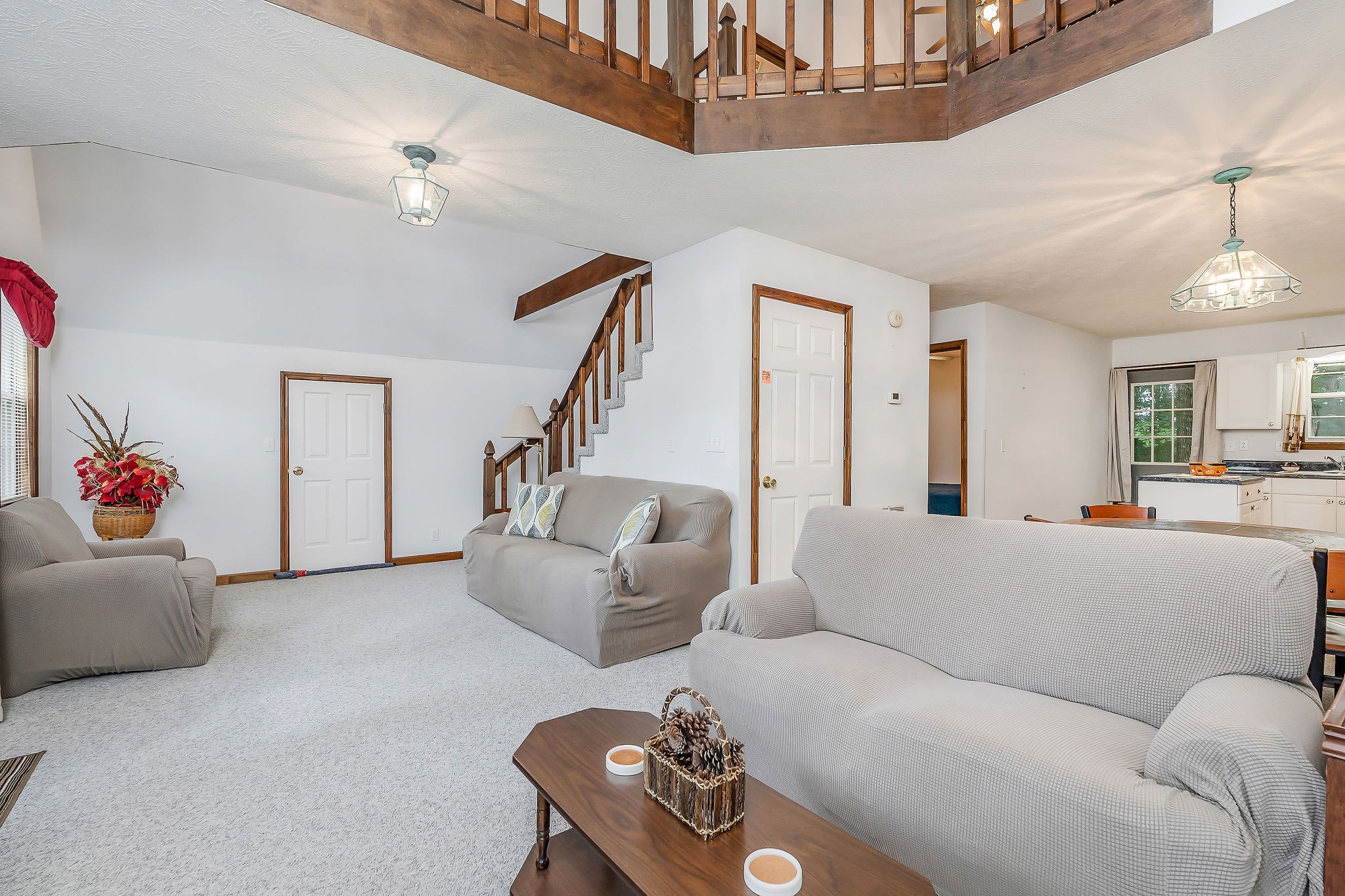 308 Cosby Parris Road Byrdstown, TN 38549 - Photo 14 of 32 a living room with furniture and a chandelier