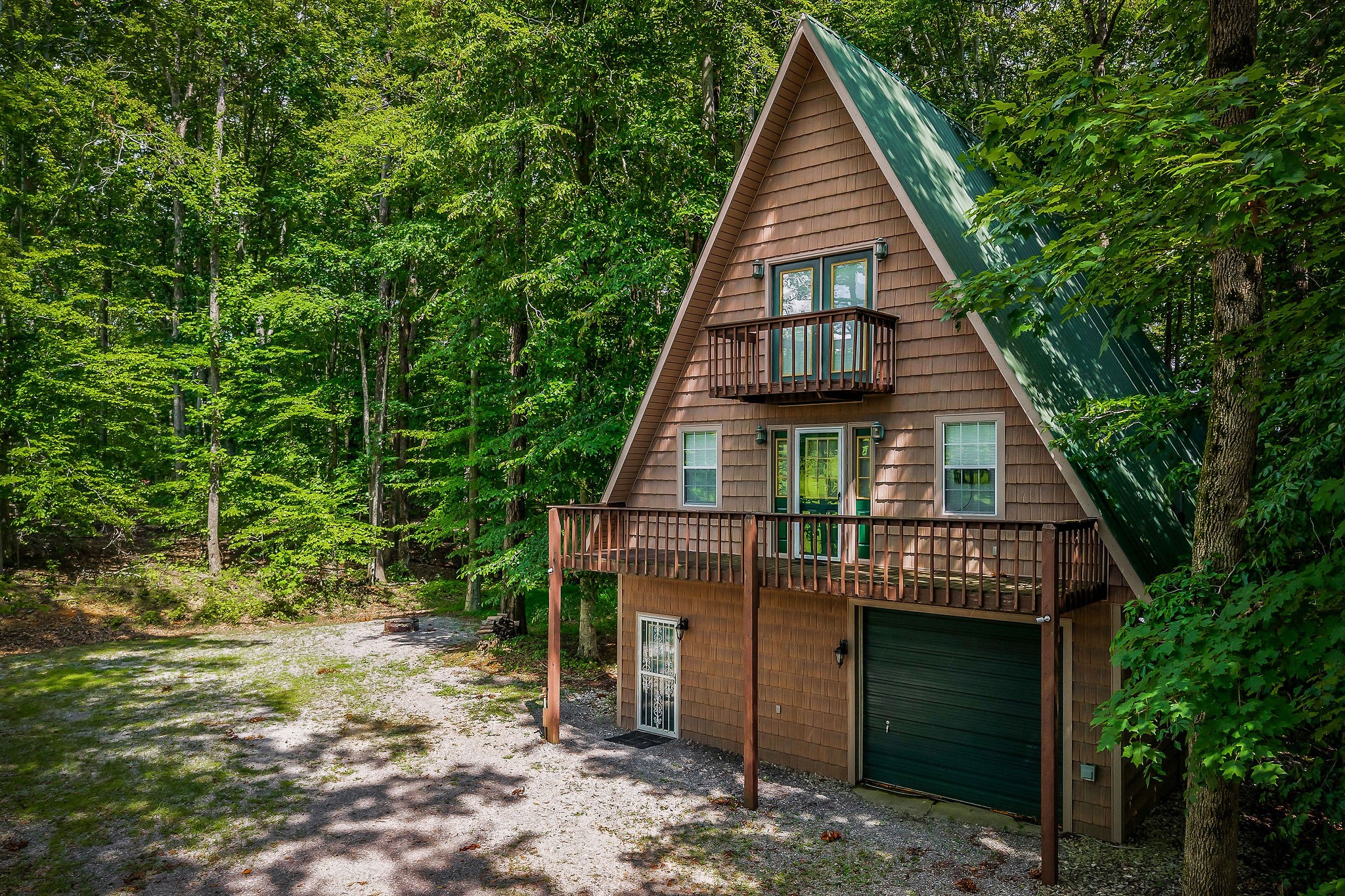 308 Cosby Parris Road Byrdstown, TN 38549 - Photo 2 of 32 a front view of a house with a yard