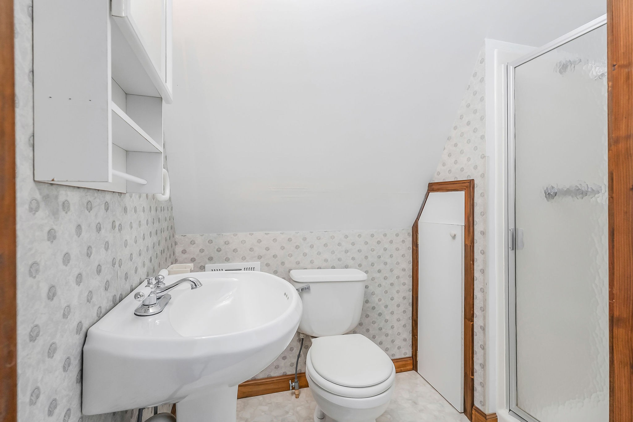 308 Cosby Parris Road Byrdstown, TN 38549 - Photo 25 of 32 a bathroom with a sink a toilet and shower