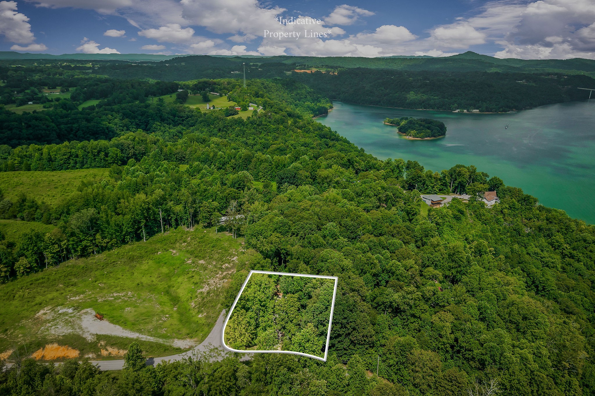 308 Cosby Parris Road Byrdstown, TN 38549 - Photo 3 of 32 front view of a house with a yard