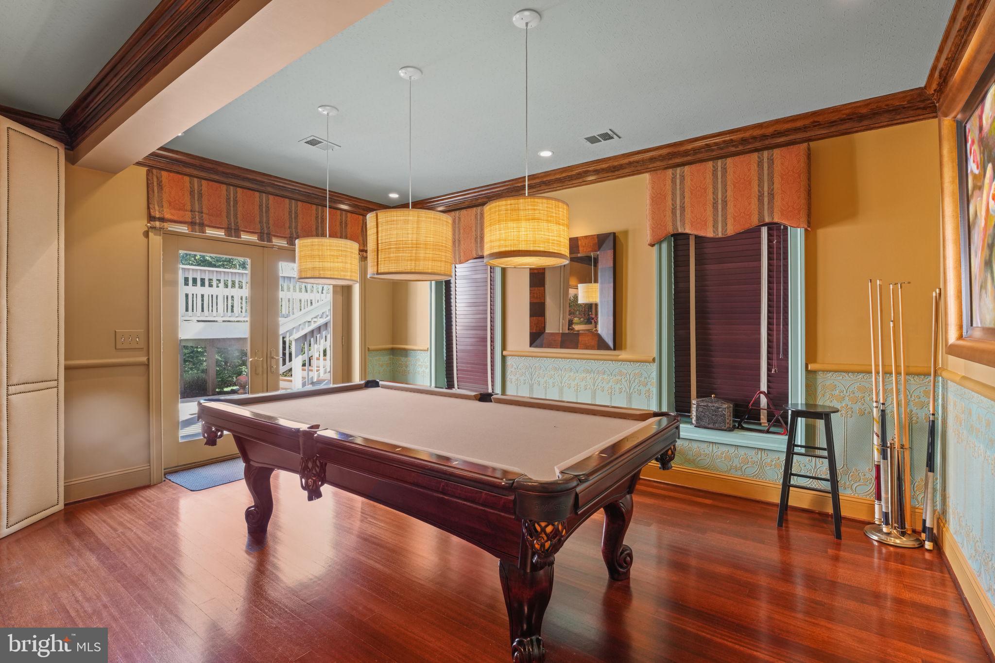 11431 Woolington Road Great Falls, VA 22066 - Photo 40 of 49 a room with pool table and windows