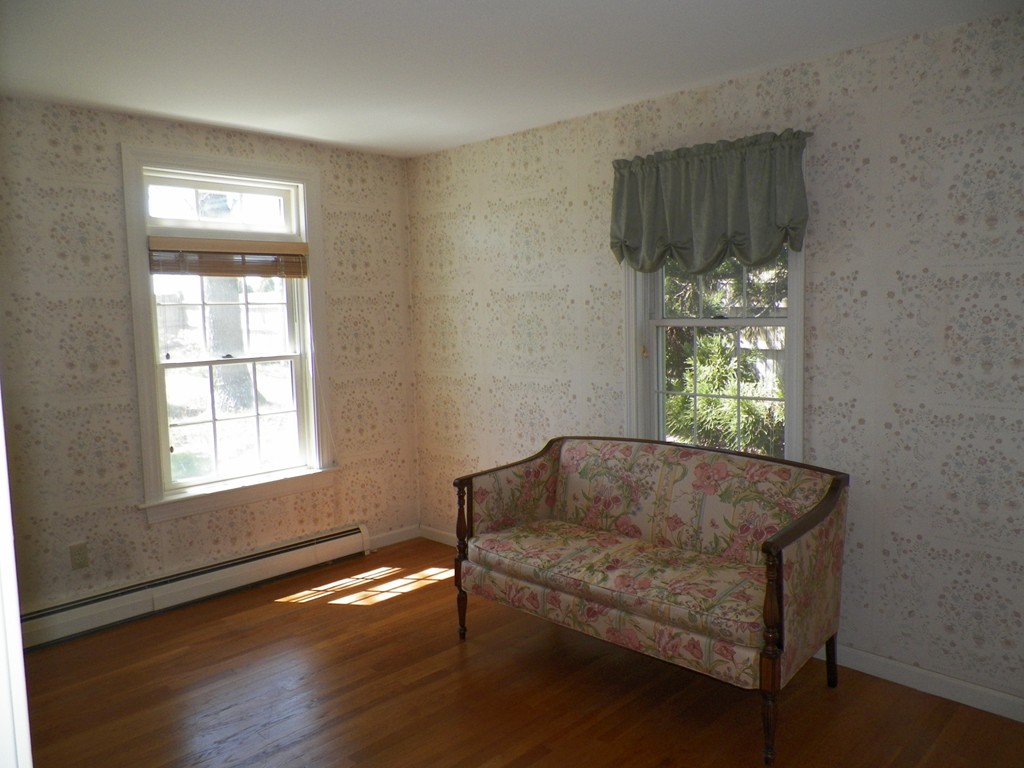 7 Homestead Road Bourne, MA 02562 - Photo 16 of 26 a living room with furniture and a window