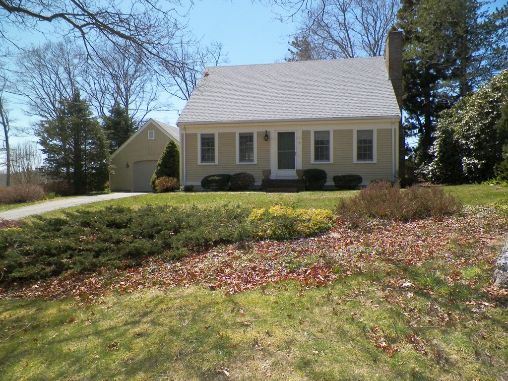 7 Homestead Road Bourne, MA 02562 - Photo 3 of 26 a front view of a house with a yard