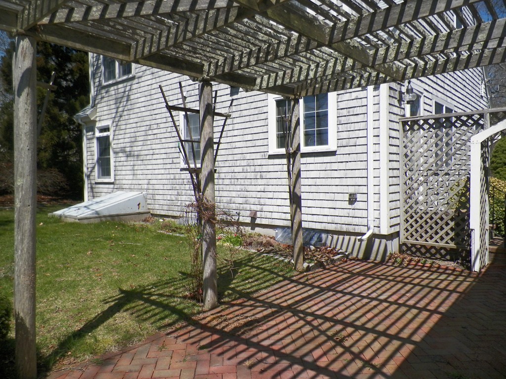 7 Homestead Road Bourne, MA 02562 - Photo 5 of 26 a view of a backyard