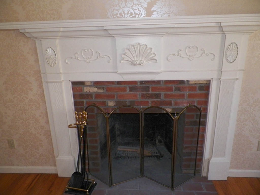 7 Homestead Road Bourne, MA 02562 - Photo 7 of 26 a view of a fireplace