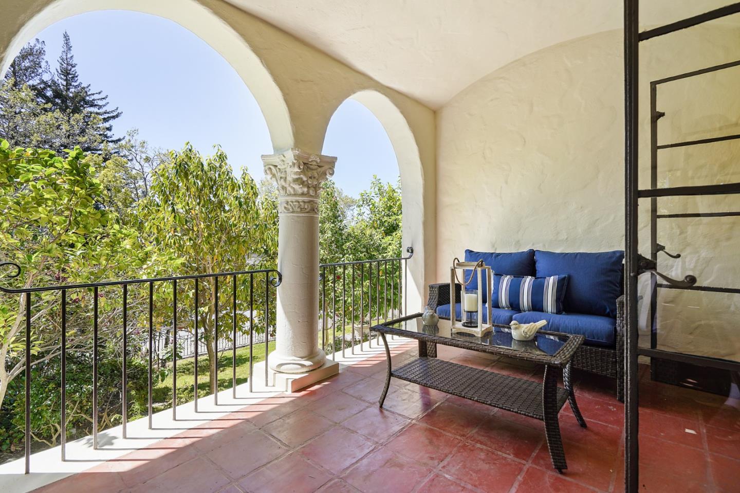 401 Parrott Drive San Mateo, CA 94402 - Photo 18 of 68 a living room with furniture and a floor to ceiling window