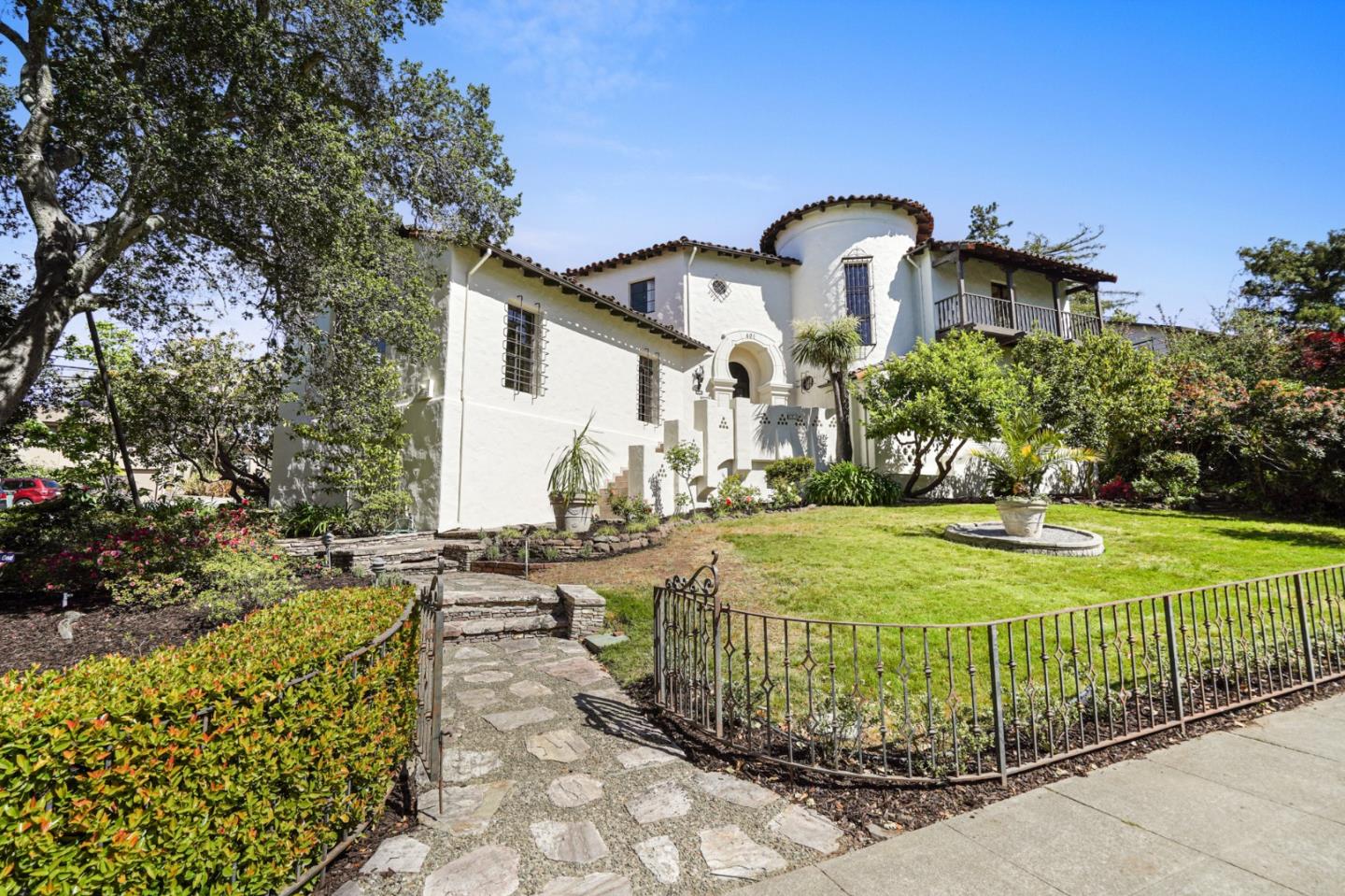 401 Parrott Drive San Mateo, CA 94402 - Photo 2 of 68 a front view of a house with a yard