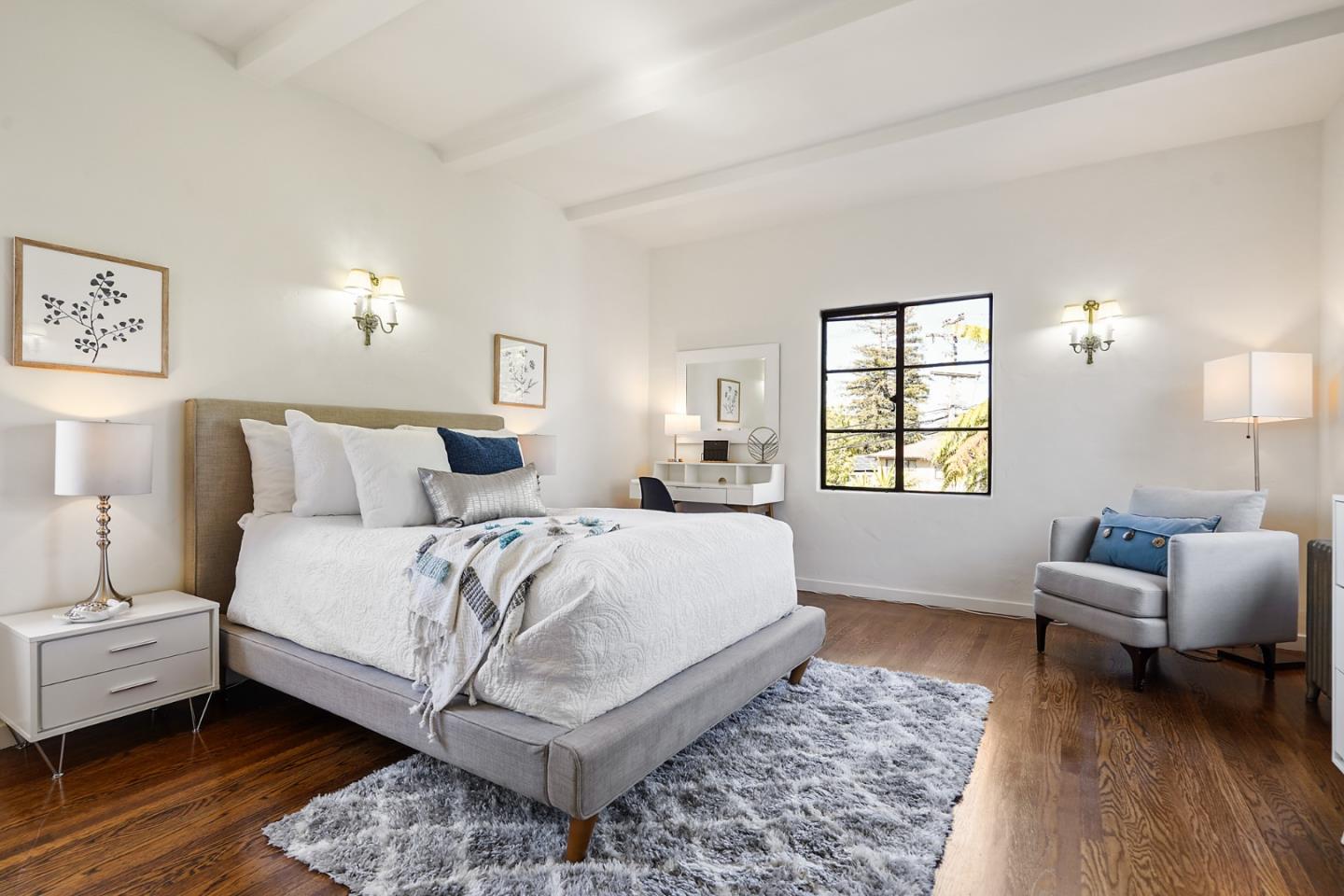 401 Parrott Drive San Mateo, CA 94402 - Photo 49 of 68 a spacious bedroom with a bed and a couch