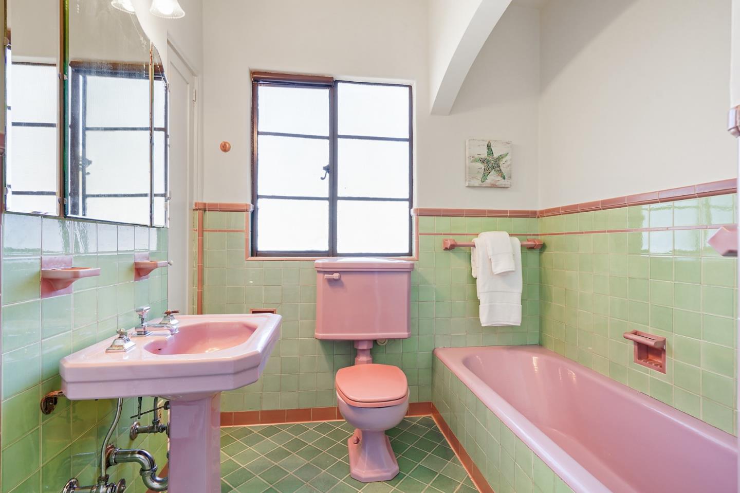 401 Parrott Drive San Mateo, CA 94402 - Photo 51 of 68 a bathroom with a sink toilet tub and shower