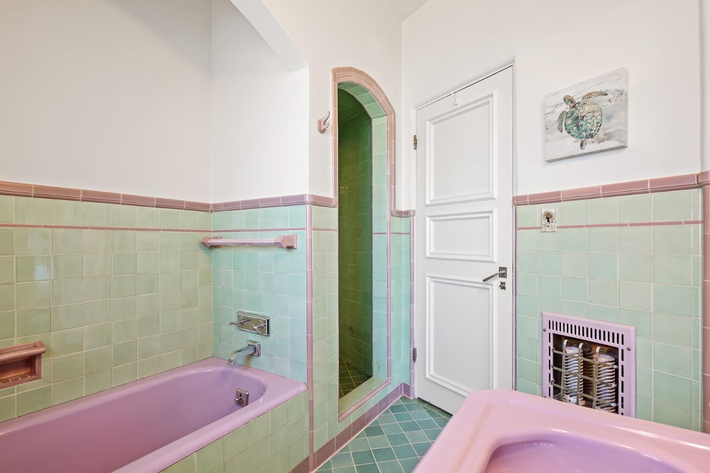 401 Parrott Drive San Mateo, CA 94402 - Photo 52 of 68 a bedroom with a bed a mirror and a shower