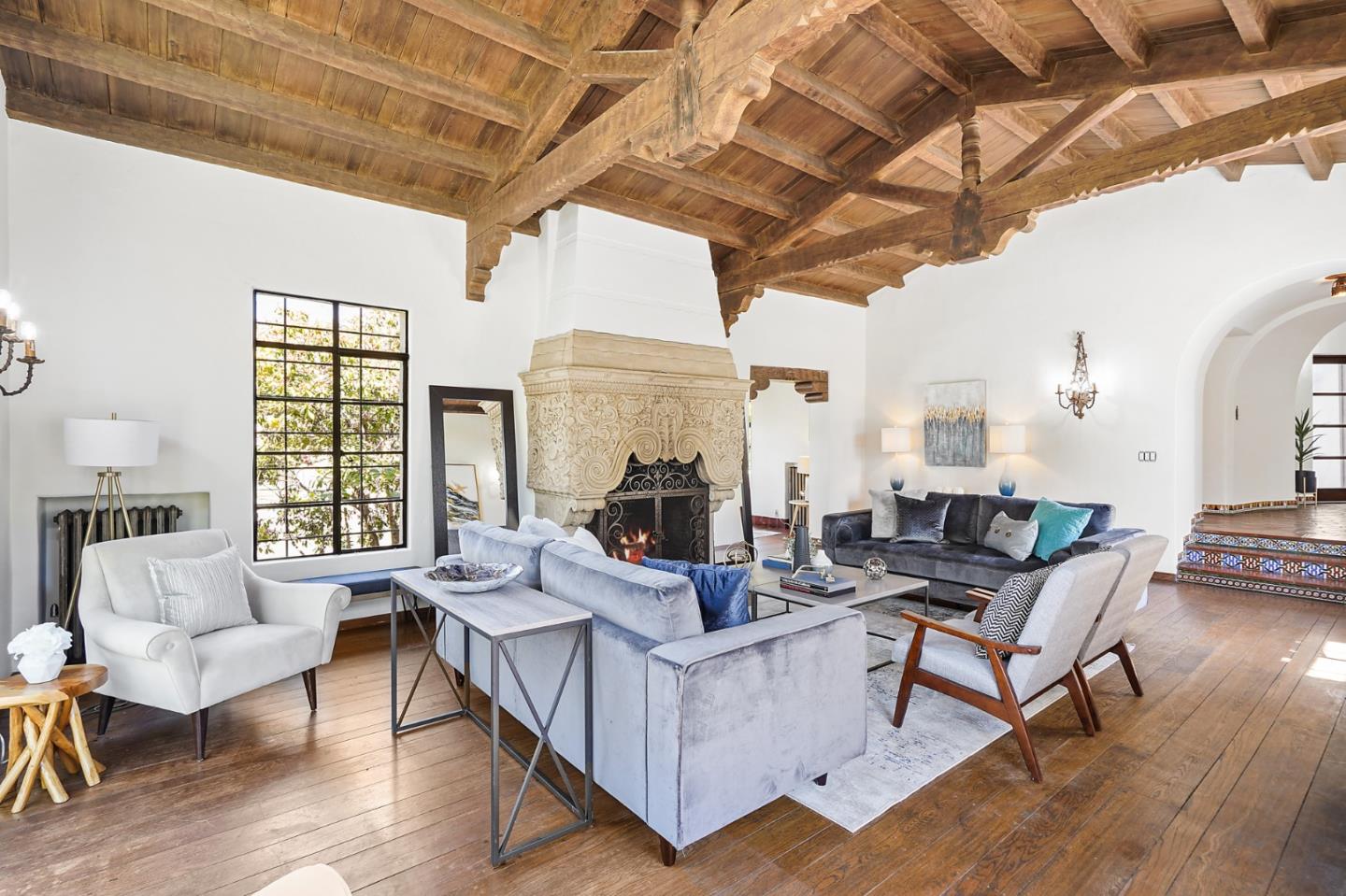 401 Parrott Drive San Mateo, CA 94402 - Photo 7 of 68 a living room with furniture and a chandelier