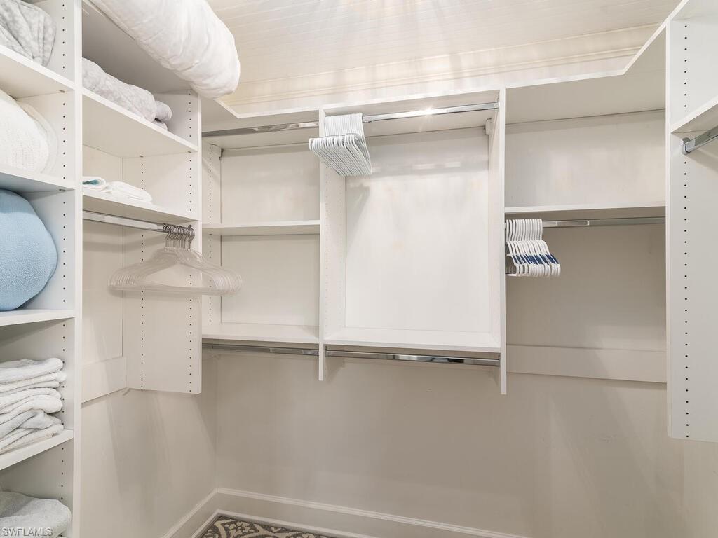 4180 Crayton Road, Unit E7 Naples, FL 34103 - Photo 16 of 35 a view of an empty walk in closet