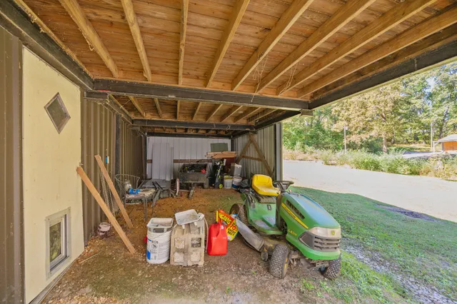 a view of swimming pool with a patio