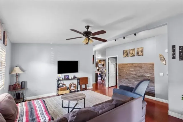 a workspace with furniture and a flat screen tv