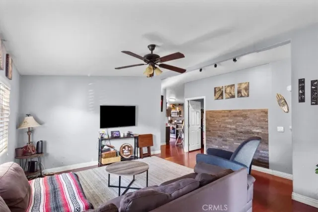 a workspace with furniture and a flat screen tv