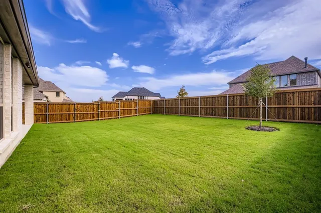 a view of a garden with a big yard