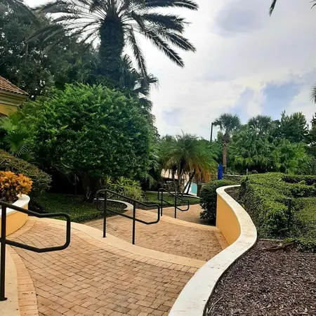 a house view with a backyard space