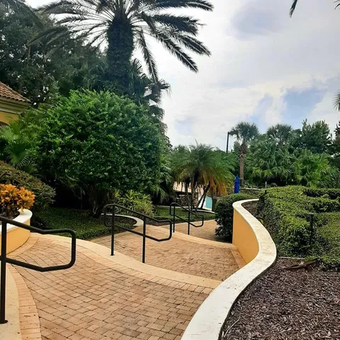 a house view with a backyard space
