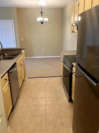 a view of a kitchen with a sink
