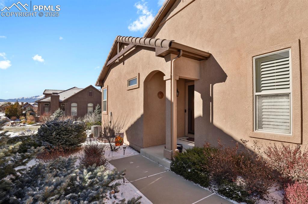 13015 Cake Bread Heights Colorado Springs, CO 80921 - Photo 2 of 45 a front view of a house with a yard