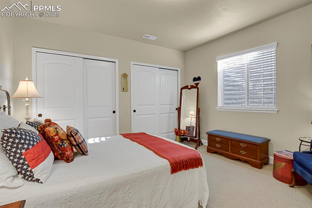 13015 Cake Bread Heights Colorado Springs, CO 80921 - Photo 34 of 45 a bedroom with bed and a window