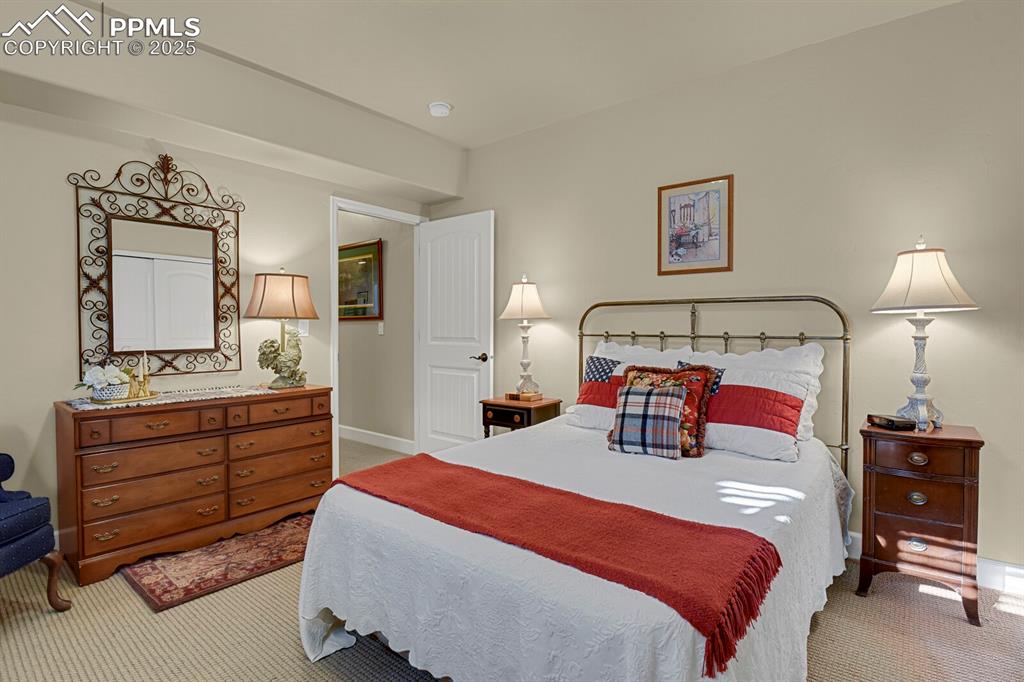 13015 Cake Bread Heights Colorado Springs, CO 80921 - Photo 35 of 45 a bedroom with a bed and a dresser